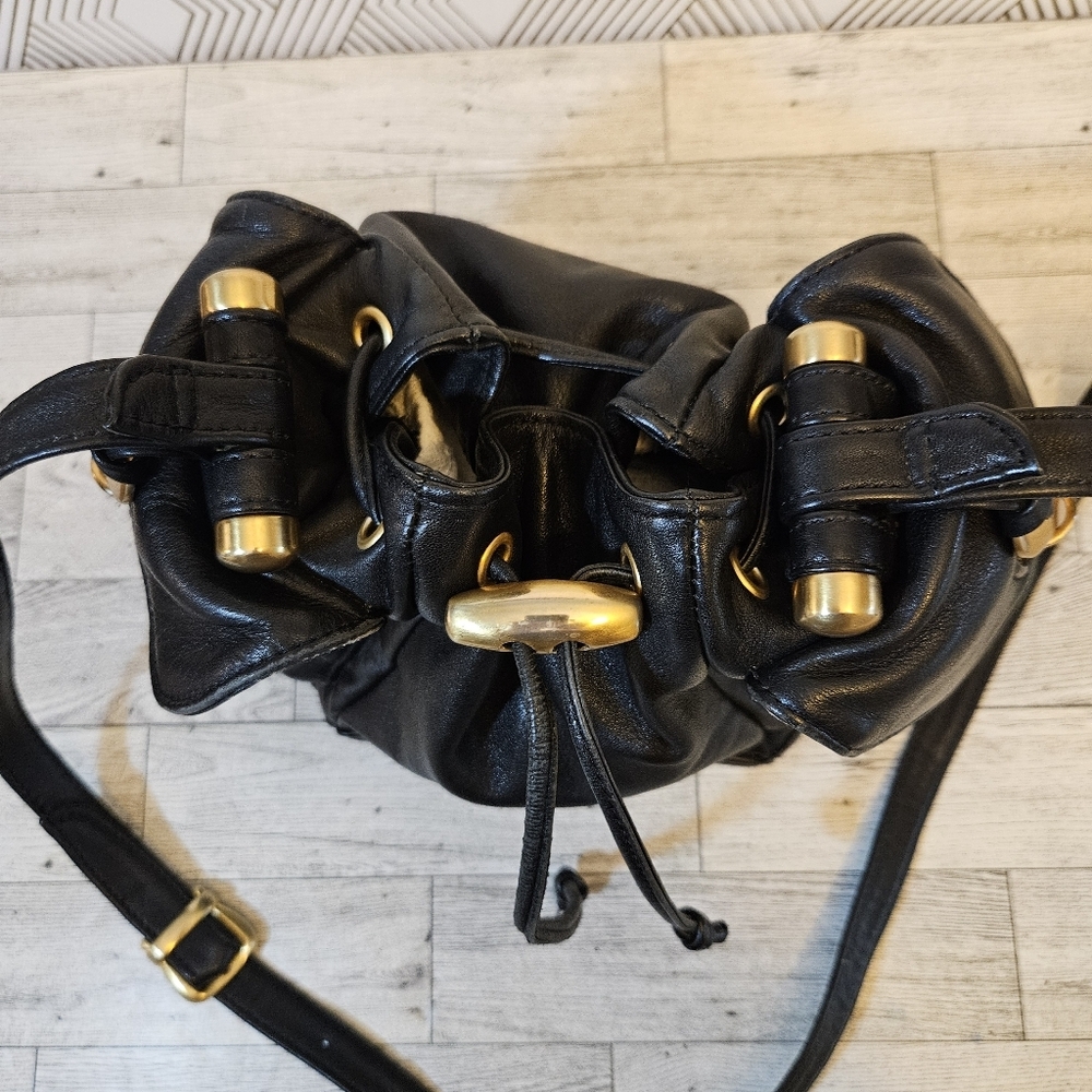 Sabina Black Leather Drawstring Shoulder Bag with Gold Accents - Picture 6 of 16